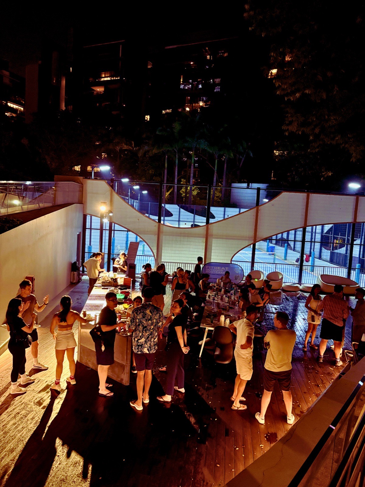 FitBeat members sharing a potluck dinner together after training