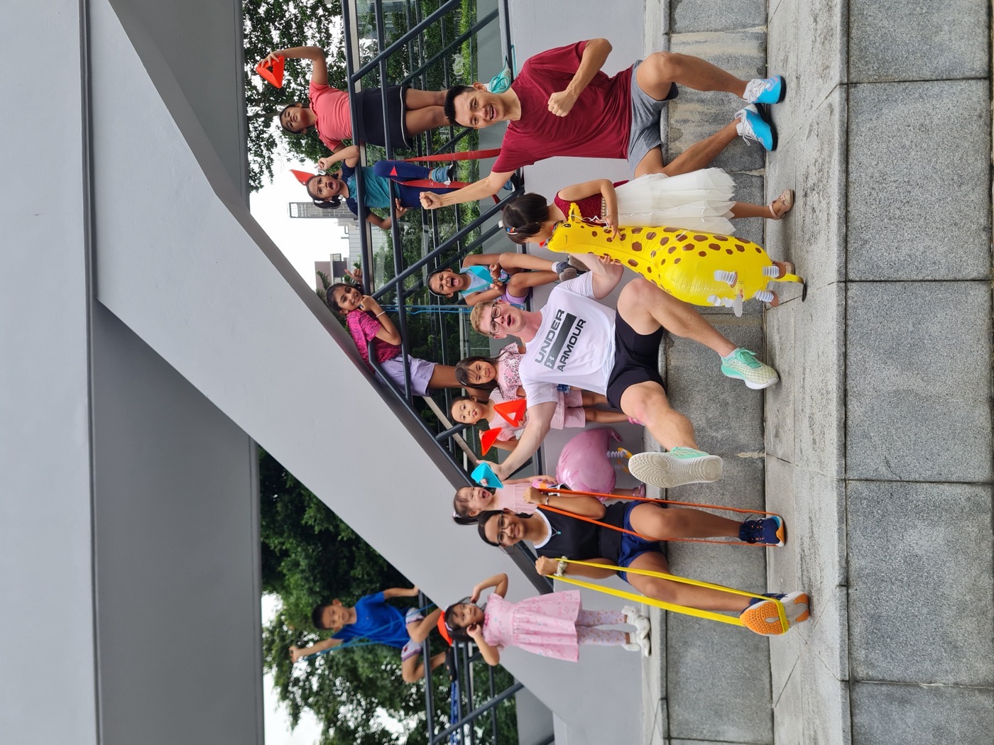 A FitBeat coach leading a kids session