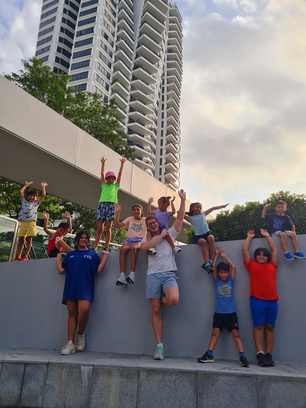 Children doing fitness at The Interlace