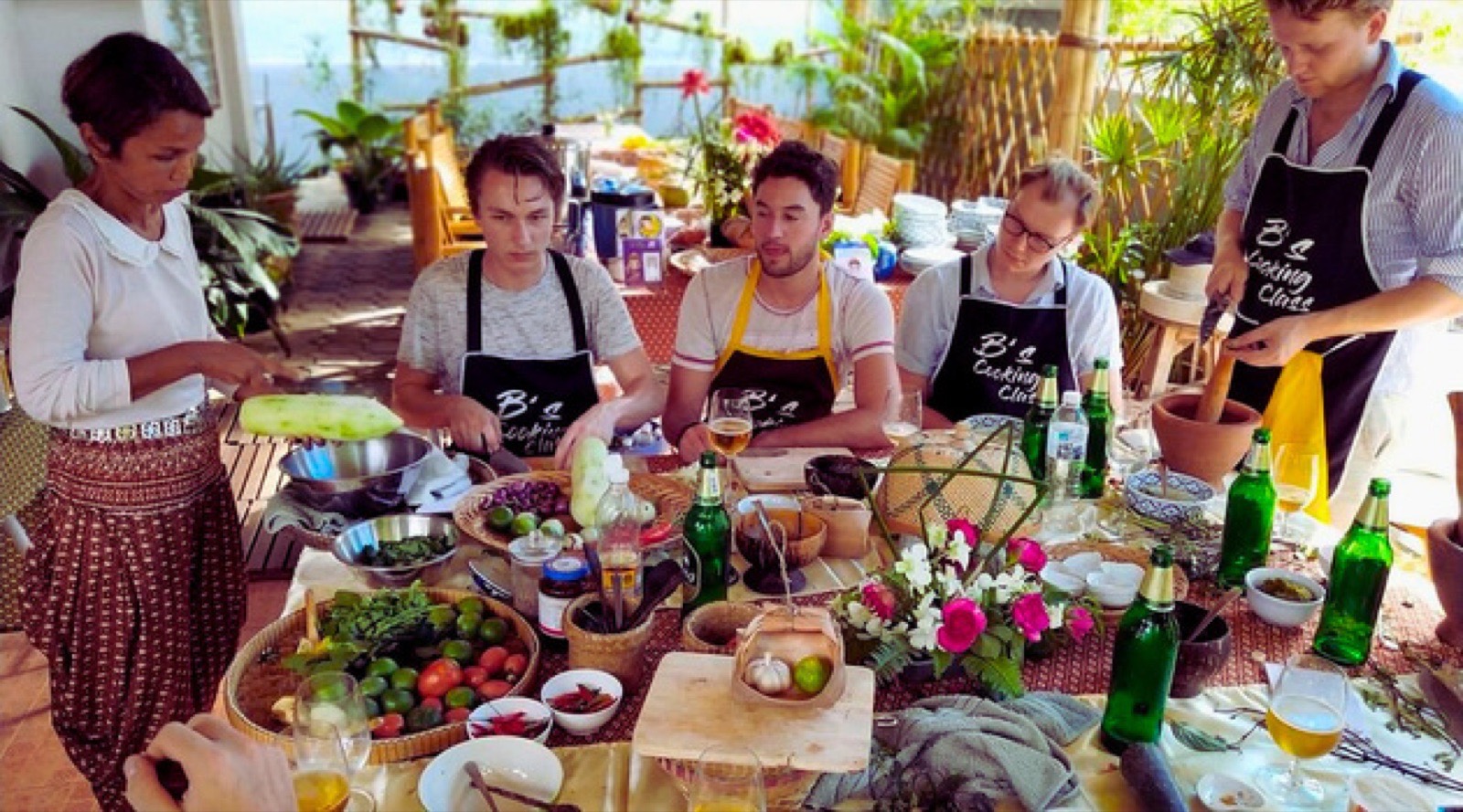 A long shared table of food at a FitBeat retreat